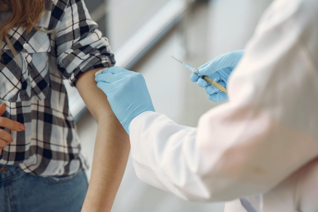 A Girl is getting vaccinated for Rabies